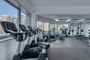 Stay fit and active in our well-equipped gym with city views.