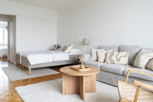 Apartment, Sea View | Living area | Flat-screen TV