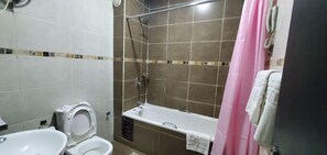 Family Room, Balcony, City View | Bathroom | Free toiletries, hair dryer, towels, soap - Rockview Hotel Classic (Abuja)