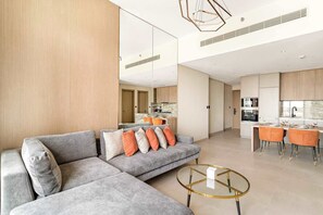 TV, offices - Luxurious Stay in JVC with Rooftop Pool & Gym (Dubai)