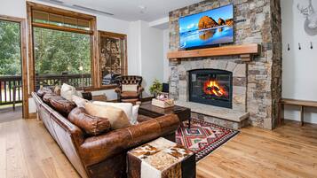 Smart TV, fireplace, foosball