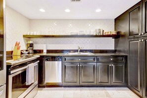 Microwave, oven, coffee/tea maker, cookware/dishes/utensils