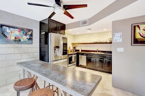 Microwave, oven, coffee/tea maker, cookware/dishes/utensils