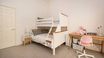 4 bedrooms, desk, iron/ironing board, travel cot