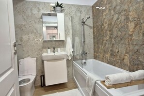 Hair dryer, towels, soap, shampoo