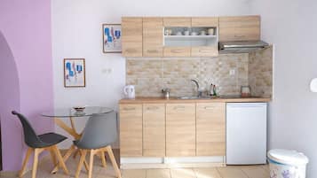 Fridge, high chair, cookware/dishes/utensils