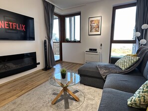 Smart TV, fireplace, table tennis, books