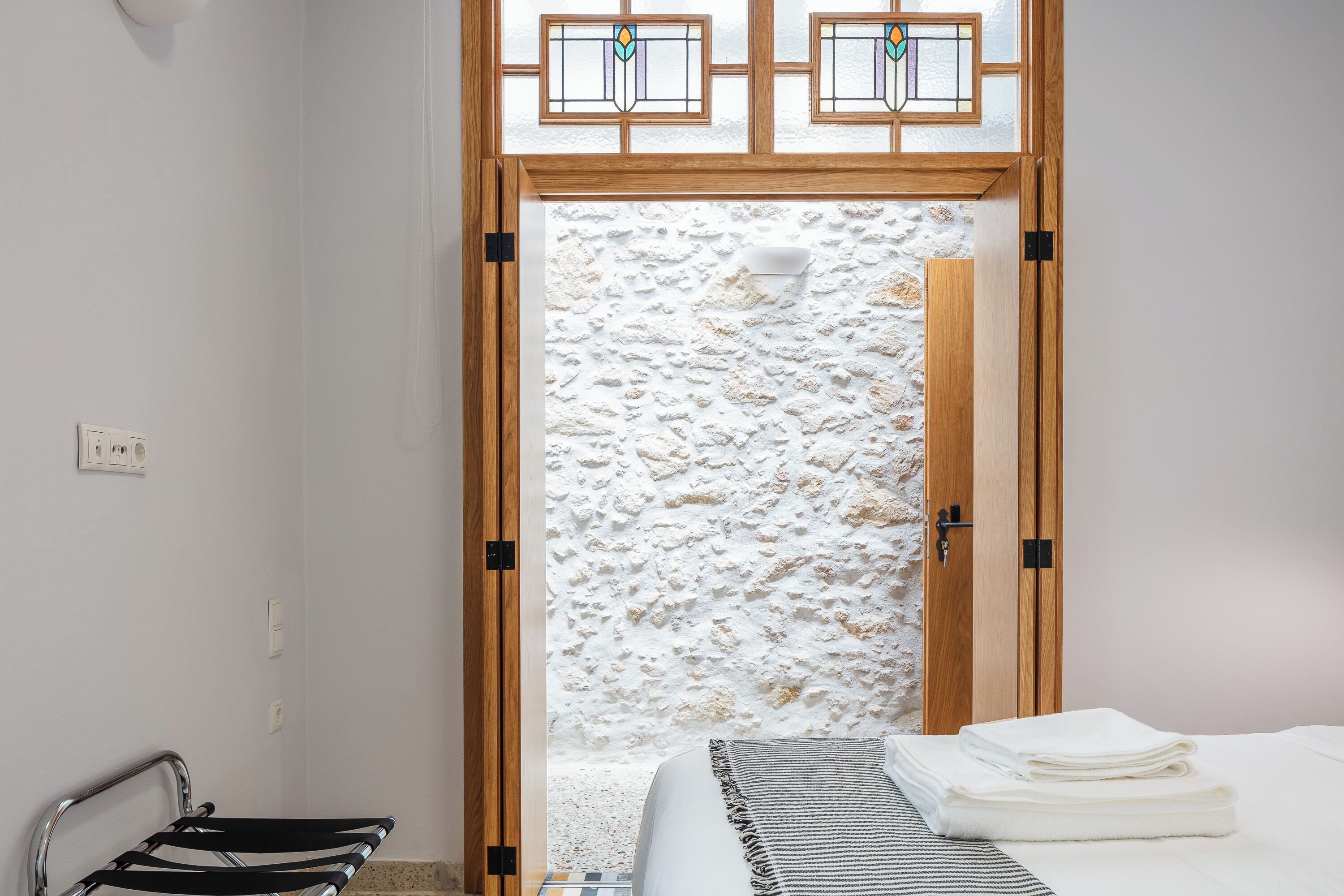 1 bedroom, desk, iron/ironing board, travel crib