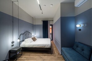 Deluxe Triple Room, Balcony | In-room safe, desk, laptop workspace, blackout drapes - RB SUITES NAPOLI (Naples)