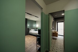 Deluxe Quadruple Room, Balcony | In-room safe, desk, laptop workspace, blackout drapes - RB SUITES NAPOLI (Naples)