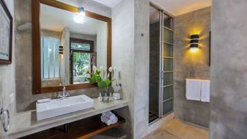 Shower, hair dryer, towels, soap