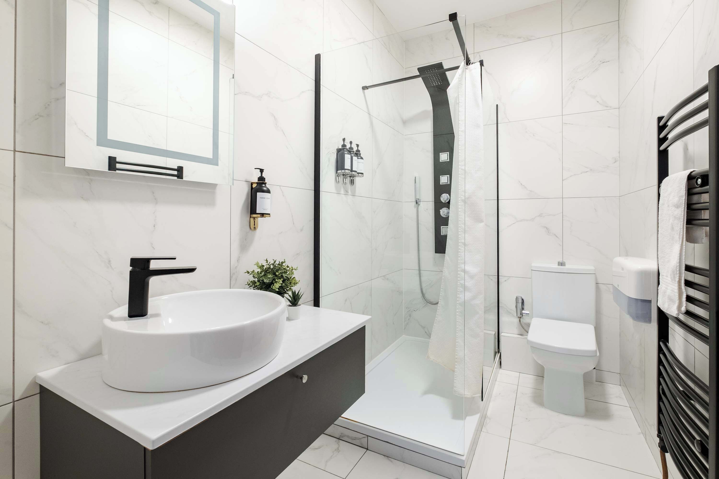 Shower, eco-friendly toiletries, hair dryer, bidet