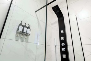 Shower, eco-friendly toiletries, hair dryer, bidet