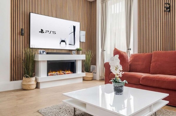 Smart TV, fireplace, video games, DVD player
