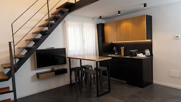 Fridge, microwave, stovetop, coffee/tea maker