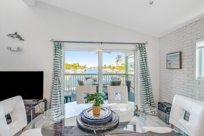 TV - Enchanting dog-friendly waterfront retreat with pool, hot tub, & amazing views (Key Colony Beach)