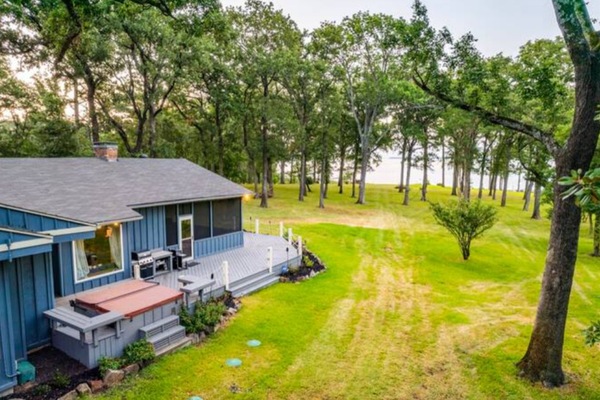 Nestled among the trees, this cozy lakeside home offers a peaceful getaway where you can unwind, explore nature, and soak in the fresh air.