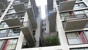A modern multi-story building with a central entrance, large windows, and balconies. - Beautiful Apartment in Lima (Lima)