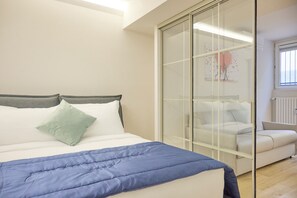 Departamento Premium | 1 habitación, ropa de cama de alta calidad y cortinas blackout 