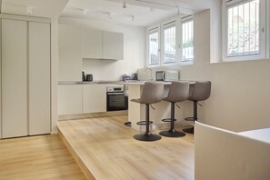 Family Apartment | Private kitchenette | Fridge, microwave, stovetop, dishwasher