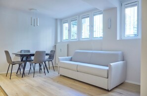 Superior Condo | Living area | Flat-screen TV