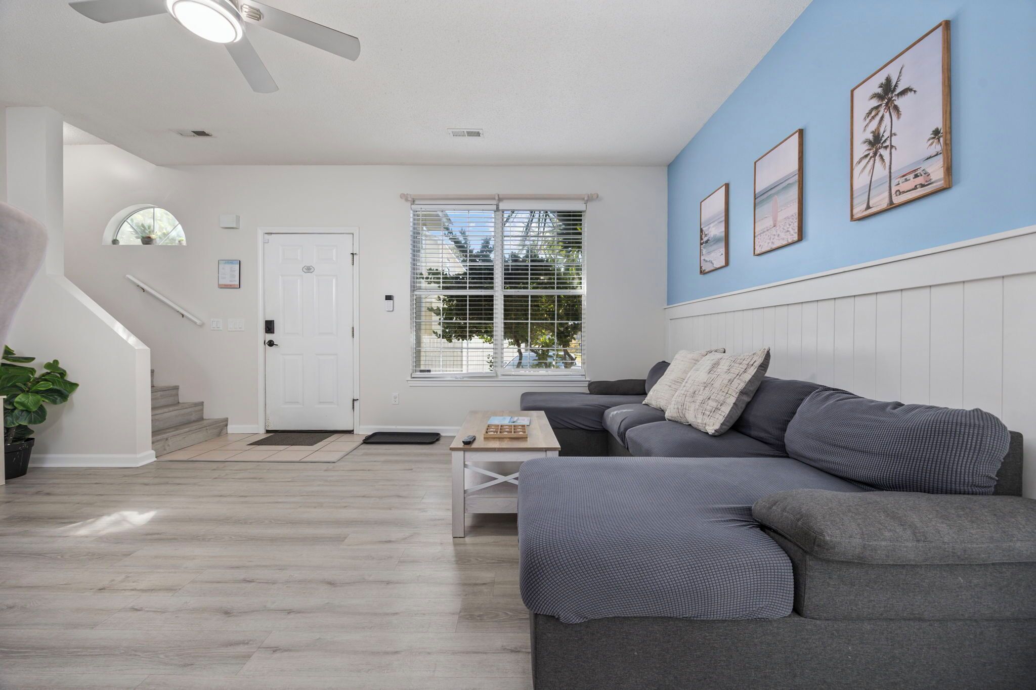 Smart TV, fireplace, books, computer monitors