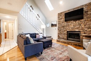 Smart TV, fireplace, foosball