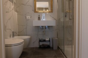 Eco-friendly toiletries, hair dryer, towels