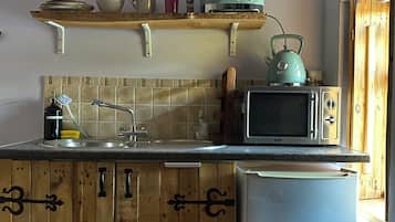 Fridge, microwave, electric kettle, toaster
