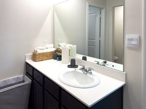 Hair dryer, towels, soap, shampoo