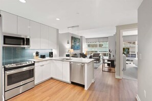 Fridge, microwave, oven, stovetop - nr Boston 1BR Getaway in Brookline Village | Covered Parking & Equipped Gym (Brookline)