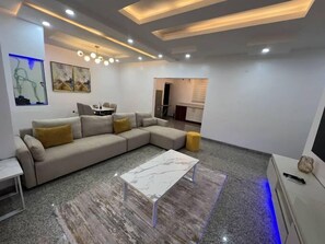 Deluxe Apartment, Balcony, City View | Living area