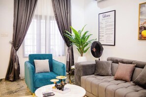 Deluxe Apartment, Balcony, City View | Living area