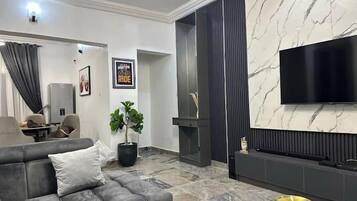 Deluxe Apartment, Balcony, City View | Living area