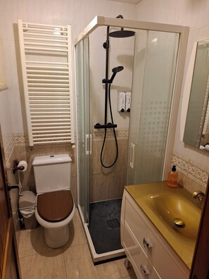 Hair dryer, towels, soap, shampoo