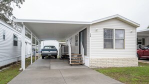 Exterior - Fully remodeled cozy mobile home in charming Zephyrhills with AC, WiFi (Zephyrhills)
