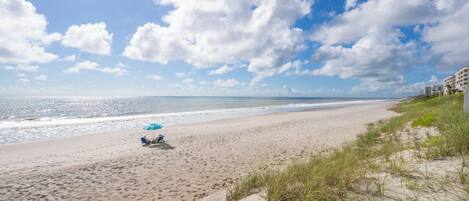 On the beach, sun loungers, beach towels
