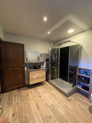 Shower, hair dryer, towels, soap