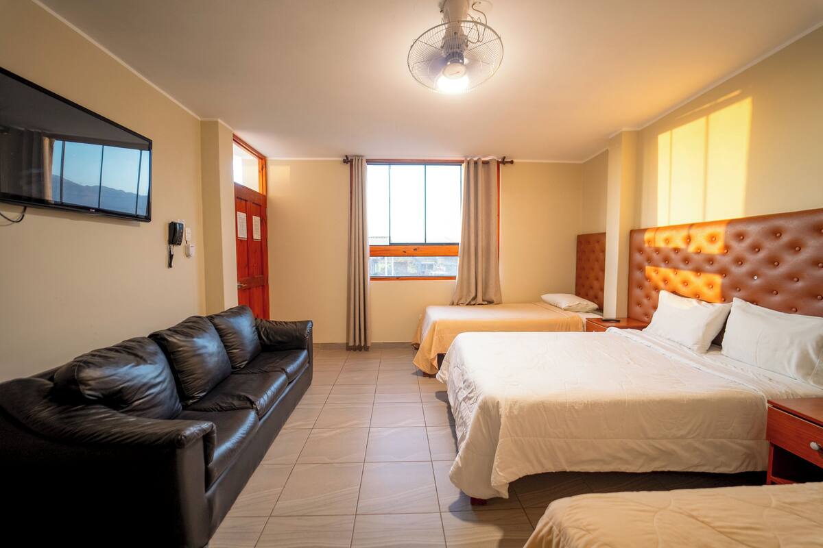 Family Quadruple Room, Multiple Beds, Private Bathroom, Garden View | Laptop workspace, WiFi (free), bed sheets