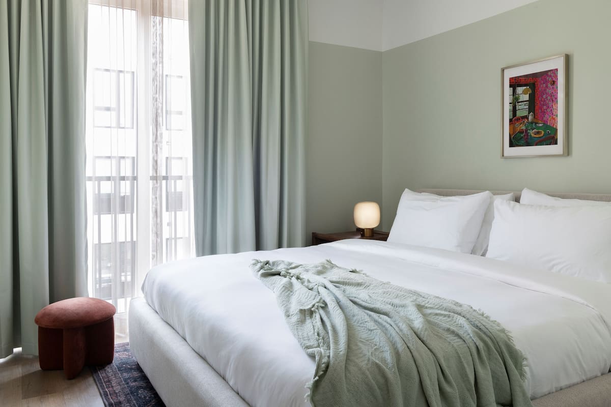 Departamento Deluxe | 1 habitación, tabla de planchar con plancha, wifi gratis y ropa de cama