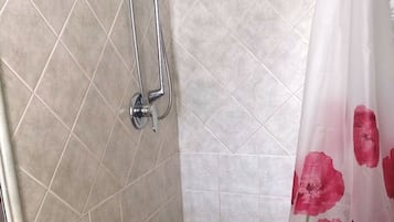 Shower, bidet, towels, soap
