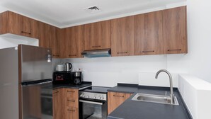 Private kitchen - Bloomfields Executive 1BR Oasis Masdar (Abu Dhabi)