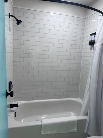 Family Double Room, Non Smoking, Private Bathroom | Bathroom | Shower, hair dryer, towels, soap. HomeField Inn.