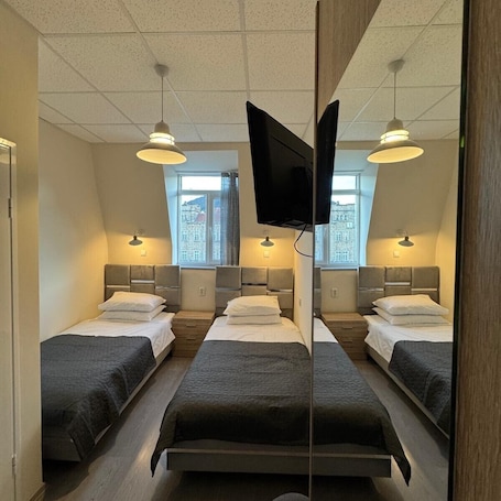 Comfort Double or Twin Room, City View | Blackout drapes, soundproofing, iron/ironing board, free WiFi