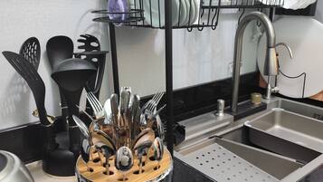 Deluxe Apartment | Private kitchen | Full-size fridge, oven, stovetop, dishwasher