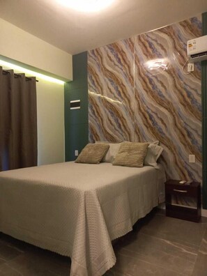 Deluxe-huoneisto | 2 makuuhuonetta, ylelliset vuodevaatteet, untuvapeitot, minibaari