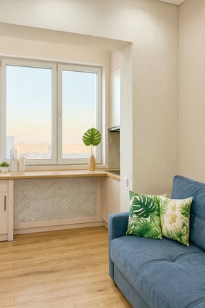 Living area - Modern 2 room with Sofa Bed & City View - Comfort city 42 - Qonaq (Almaty)