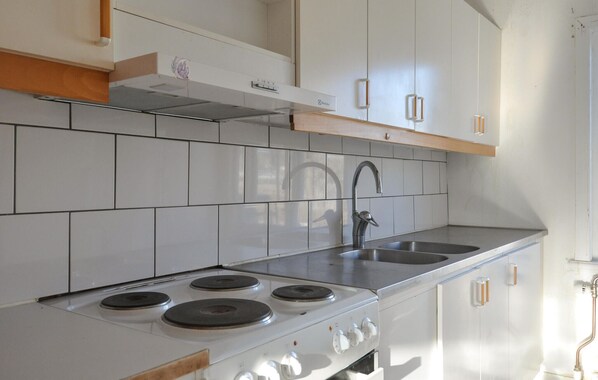 Fridge, microwave, coffee/tea maker, cookware/dishes/utensils
