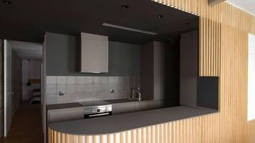 Een koelkast, een microgolfoven, een oven, een kookplaat