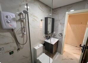 Hair dryer, towels, soap, toilet paper